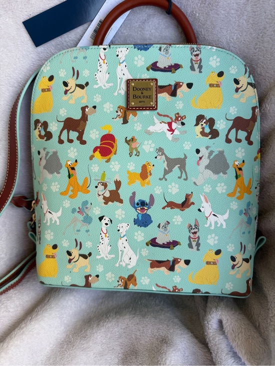 Dooney & Bourke Other - Dooney & Bourke Mint Disney Dogs Print Backpack with Brown Trim